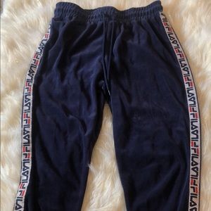 Blue, red, and white fila sweatpants